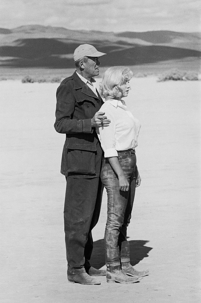 Director John Huston and Marilyn Monroe during the filming of ‘The Misfits’ on location in the Nevada Desert.
