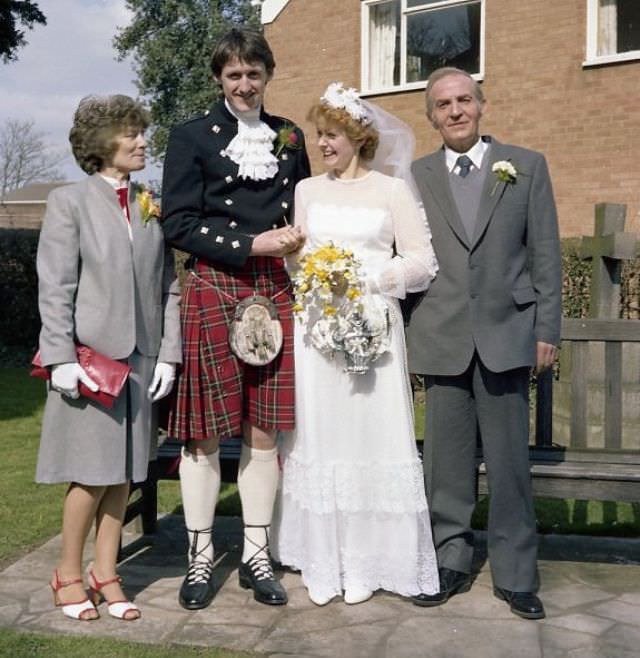 #23 Bride and Groom with their parents