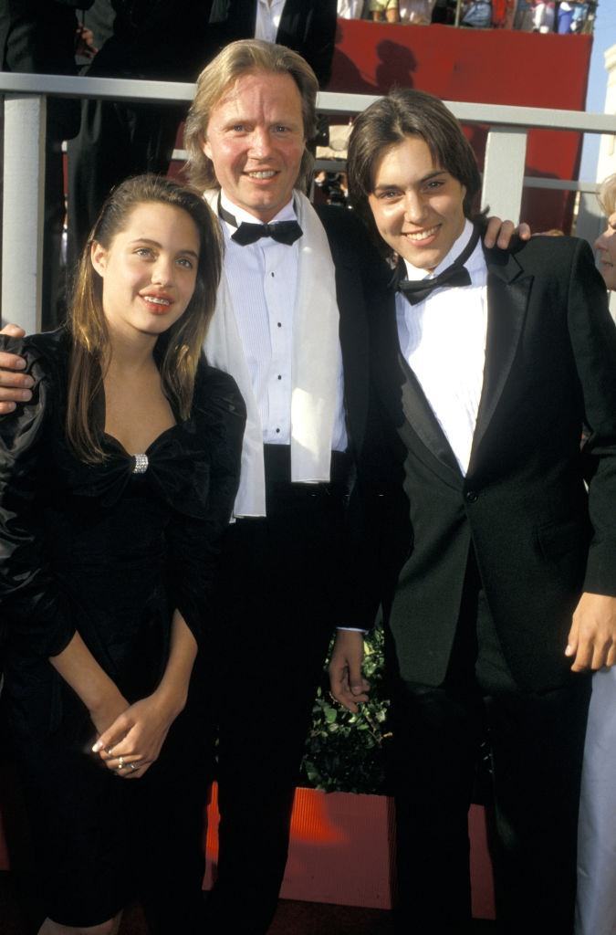 #9 Angelina Jolie with her father and brother at 60th Annual Academy Awards, 1988.