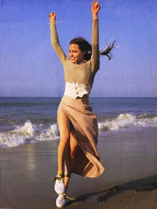 #14 Angelina Jolie chilling on the beach, 1993.