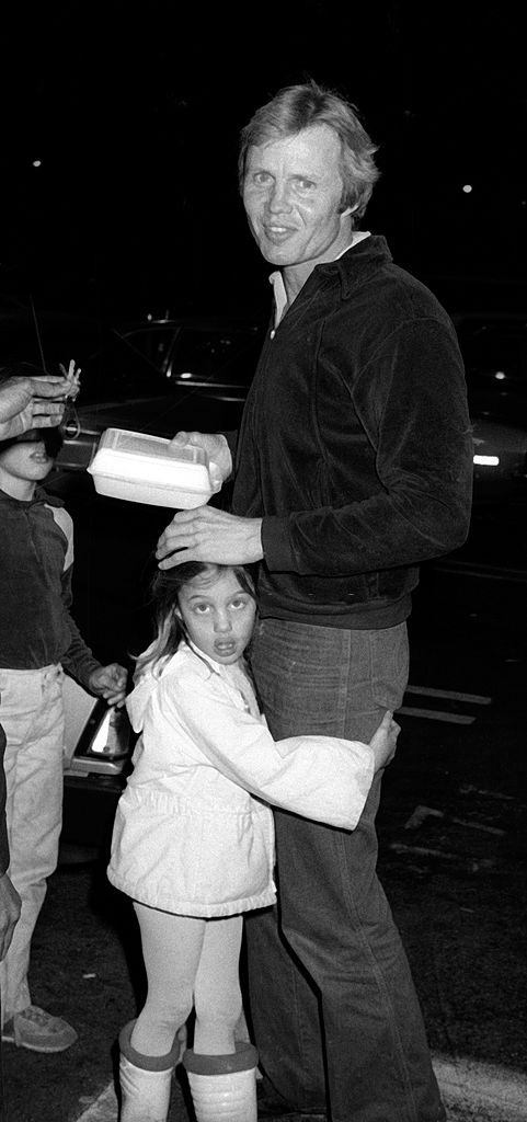 #6 Angelina Jolie with her father and brother, 1981.