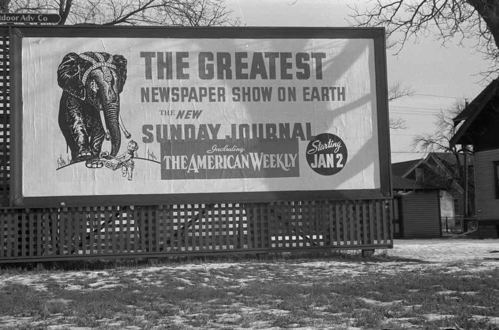 #55 This billboard from 1937 advertises for the Minneapolis Journal newspaper.