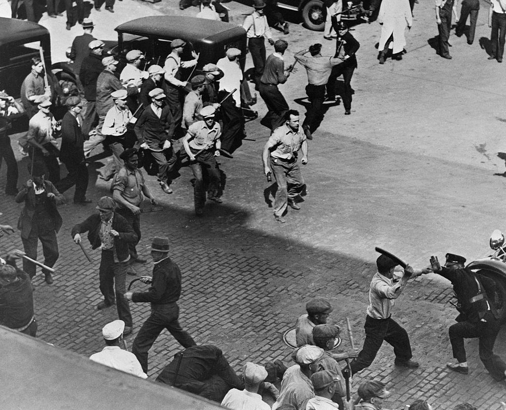 #84 Police intervene in a clash between striking truckers and the citizen’s army. Minneapolis. Minnesota. May 21st, 1934