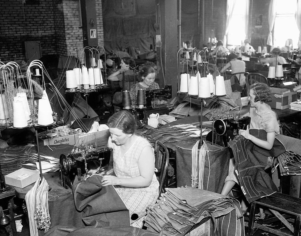 #88 Women sew denim overalls in the Lee Work Clothes factory in Minneapolis, 1935.
