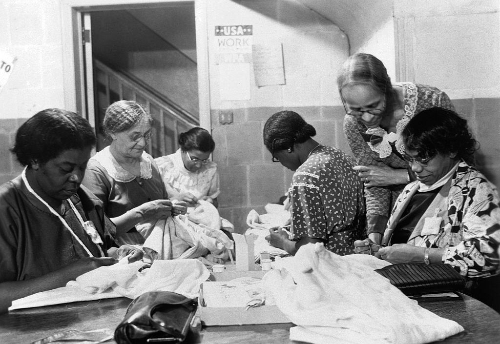 #89 A group of elderly women work on projects at the Phyllis Wheatley Settlement House in Minneapolis, 1936.