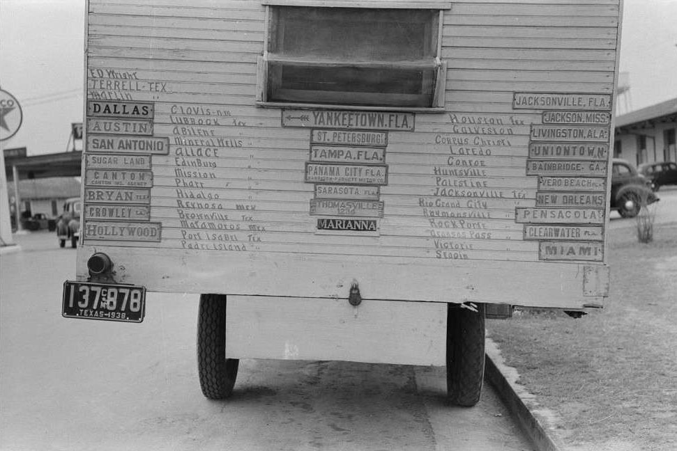 #12 Truck home of traveler with plates from cities he has visited. Harlingen, Texas.