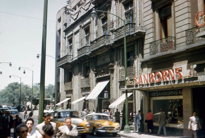 #59 Street scene showing Sanborns. Mexico City, 1957