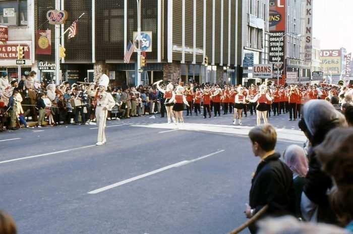 #19 This young man is advertising the Soap Box Derby at the American Royal Parade in 1967.