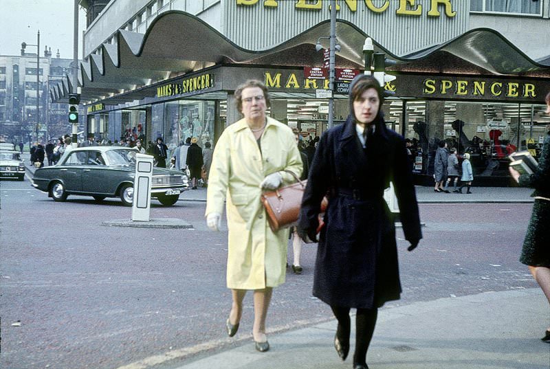 #10 Shoppers outside the Marks & Spencer store at the junction of Cross Street, Corporation Street and St Mary’s Gate in 1964.