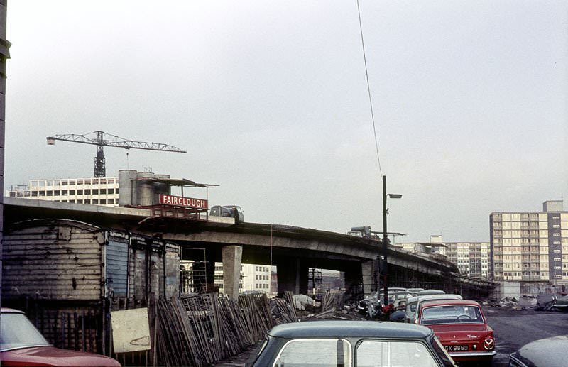 #12 The elevated section of the Mancunian Way under construction in 1966.