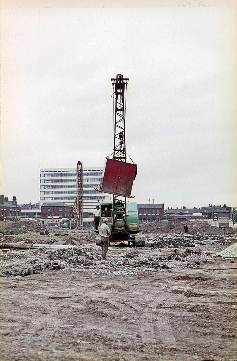 #50 Preliminary construction work taking place on open ground on the east side of Hulme, around 1967.