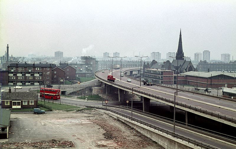#23 The elevated section of the Mancunian Way and adjoining slip road at All Saints, 1968.