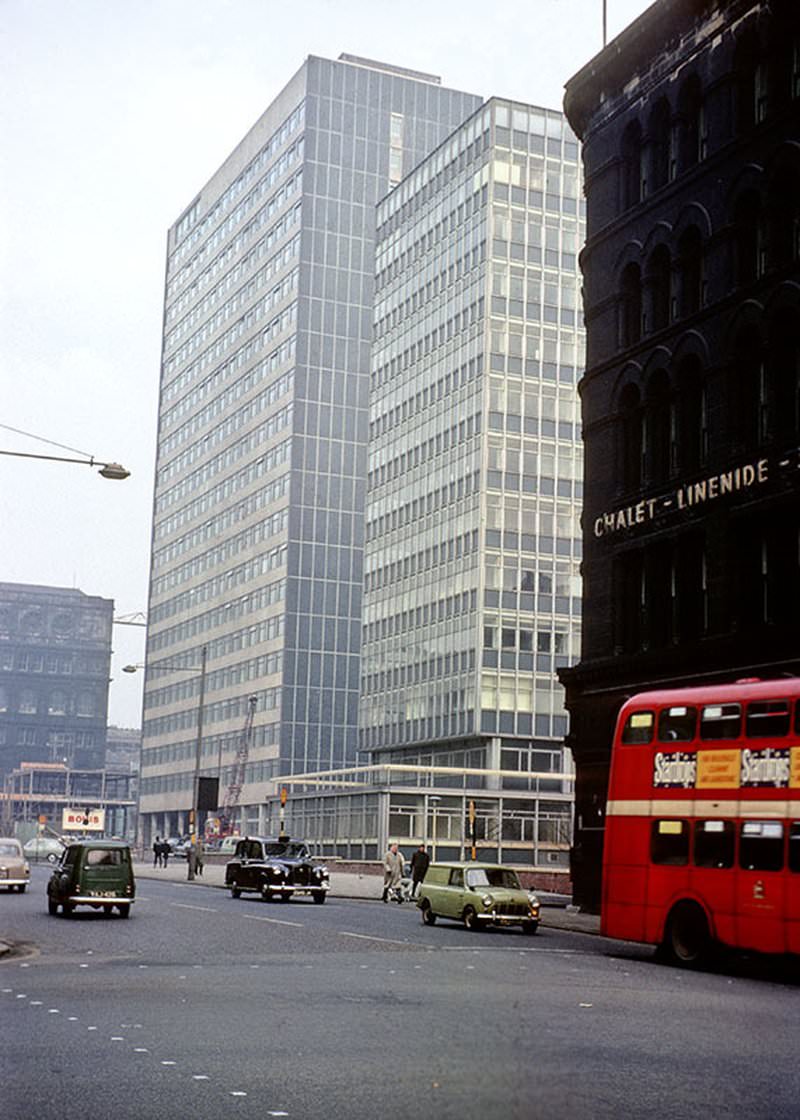 #42 St Andrew’s House (left) and Telephone House (centre), two newly built office blocks on the south-east side of Portland Street in 1963.