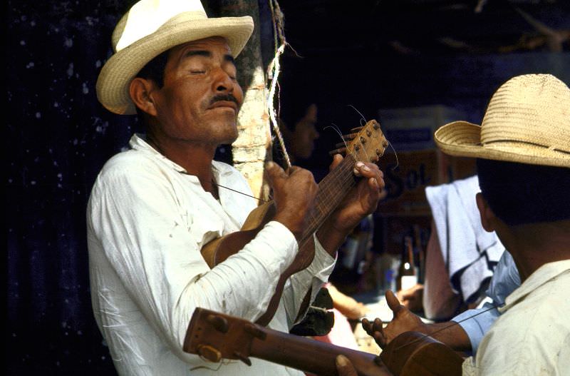 #37 Mariachi singers strumming on ukuleles, 1968