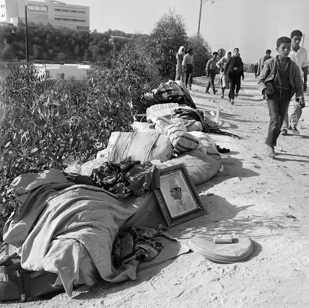 #30 People flee the city following the earthquake in Agadir, Morocco in March 1960.