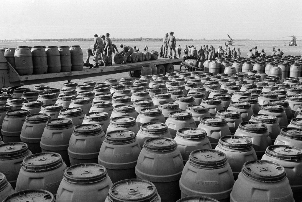 #4 Moroccan soldiers prepare water containers 5 on an air base in Marrakech for the Green March event towards the Spanish border of Western Sahara. 23, October 1975