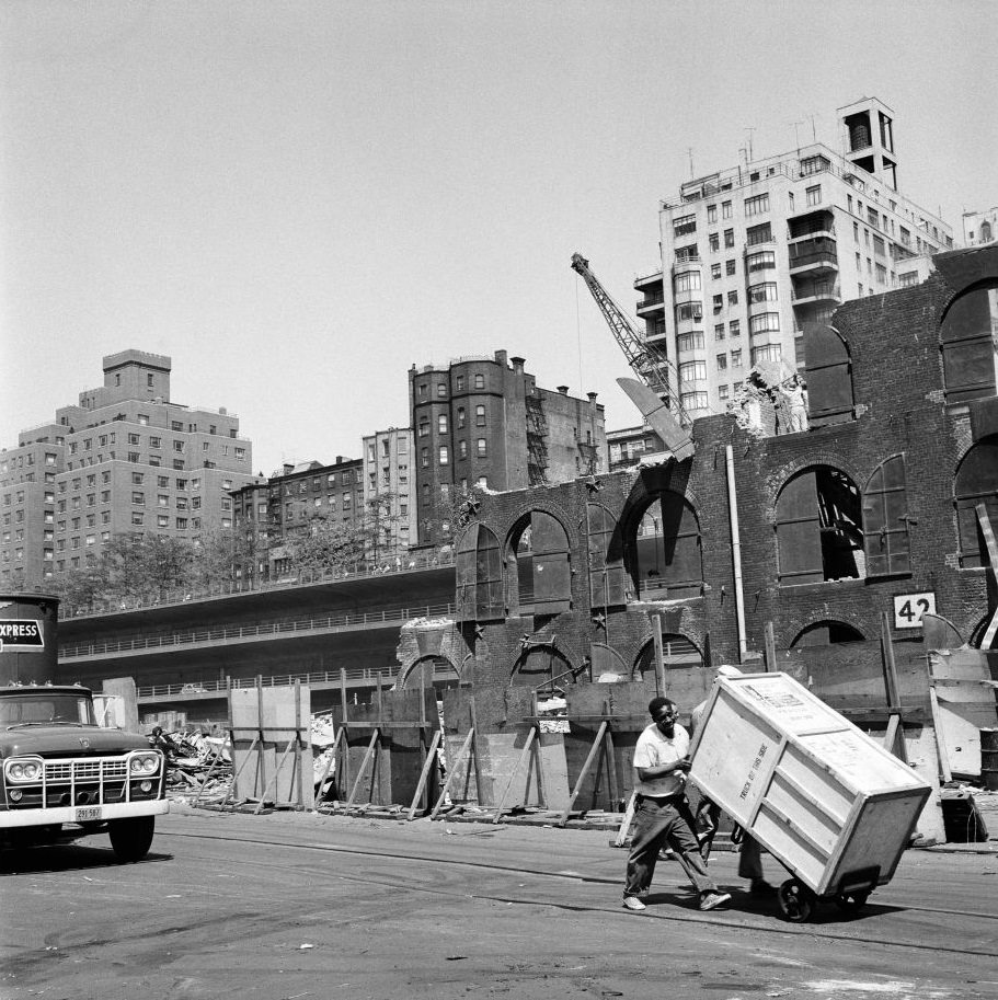 #36 Men make delivery near construction site in Brooklyn Heights, March 1958.