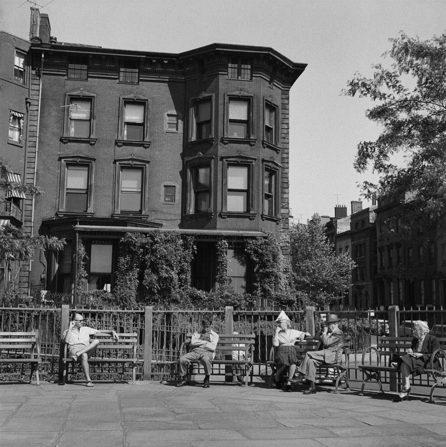 #17 People sit on the Promenade in Brooklyn Heights, March 1958.