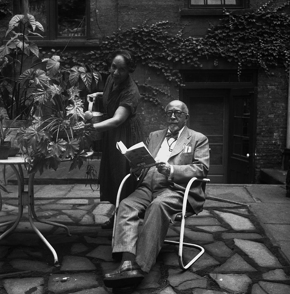 #23 Author, sociologist, historian and civil rights activist W. E. B. Du Bois with his wife author, playwright, composer, and activist Shirley Graham Du Bois at their home at 31 Grace Court in Brooklyn Heights in 1958