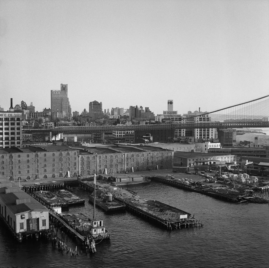 #62 A view of the waterfront in Brooklyn Heights (now called DUMBO), with a view of the Brooklyn Bridge, March 1958.