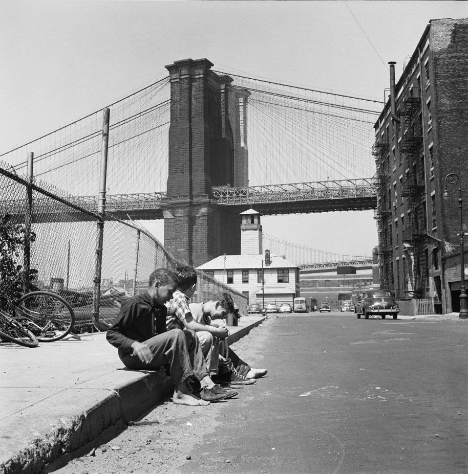 #27 Kids in Brooklyn Heights with the Brooklyn Bridge behind them, March 1958.