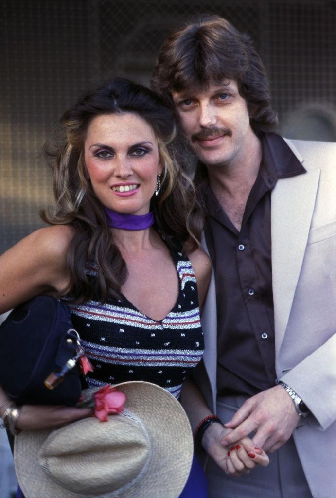 #24 Caroline Munro with her husband Judd Hamilton in France, 1980.