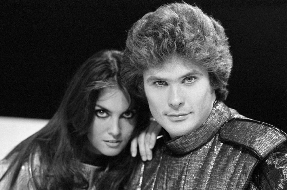 #21 Caroline Munro with David Hasselhoff, 1977.