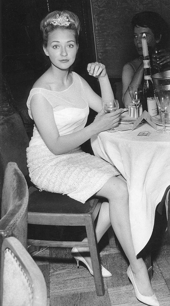 #14 Christine Kaufmann enjoying the drink, 1960.