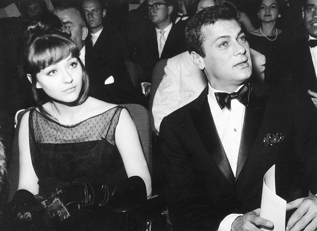 #31 Christine Kaufmann with Tony Curtis at the Berlin Film Festival, 1962.