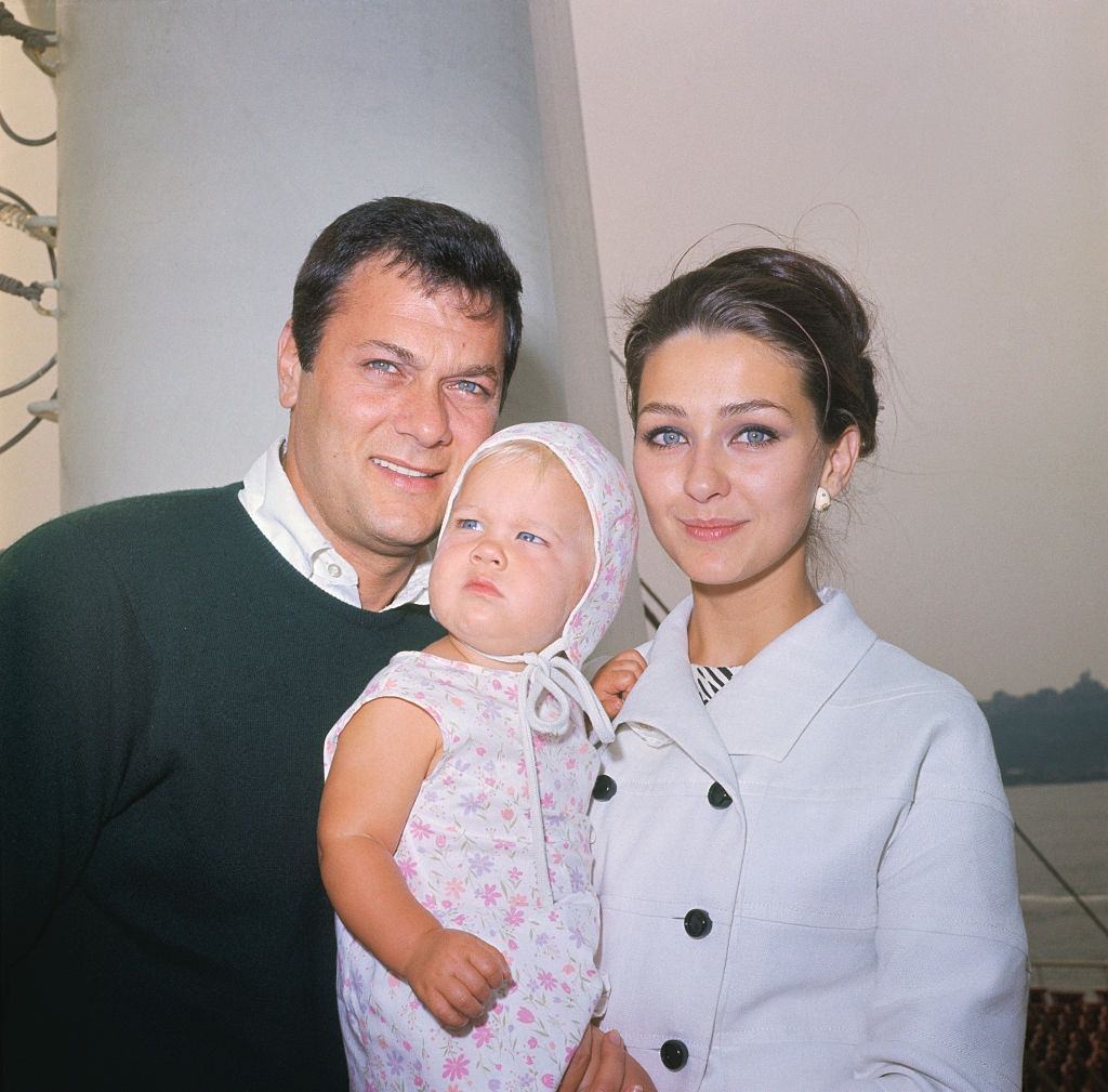 #36 Christine Kaufmann with her husband, Tony Curtis and daughter Alexandra, 1964.