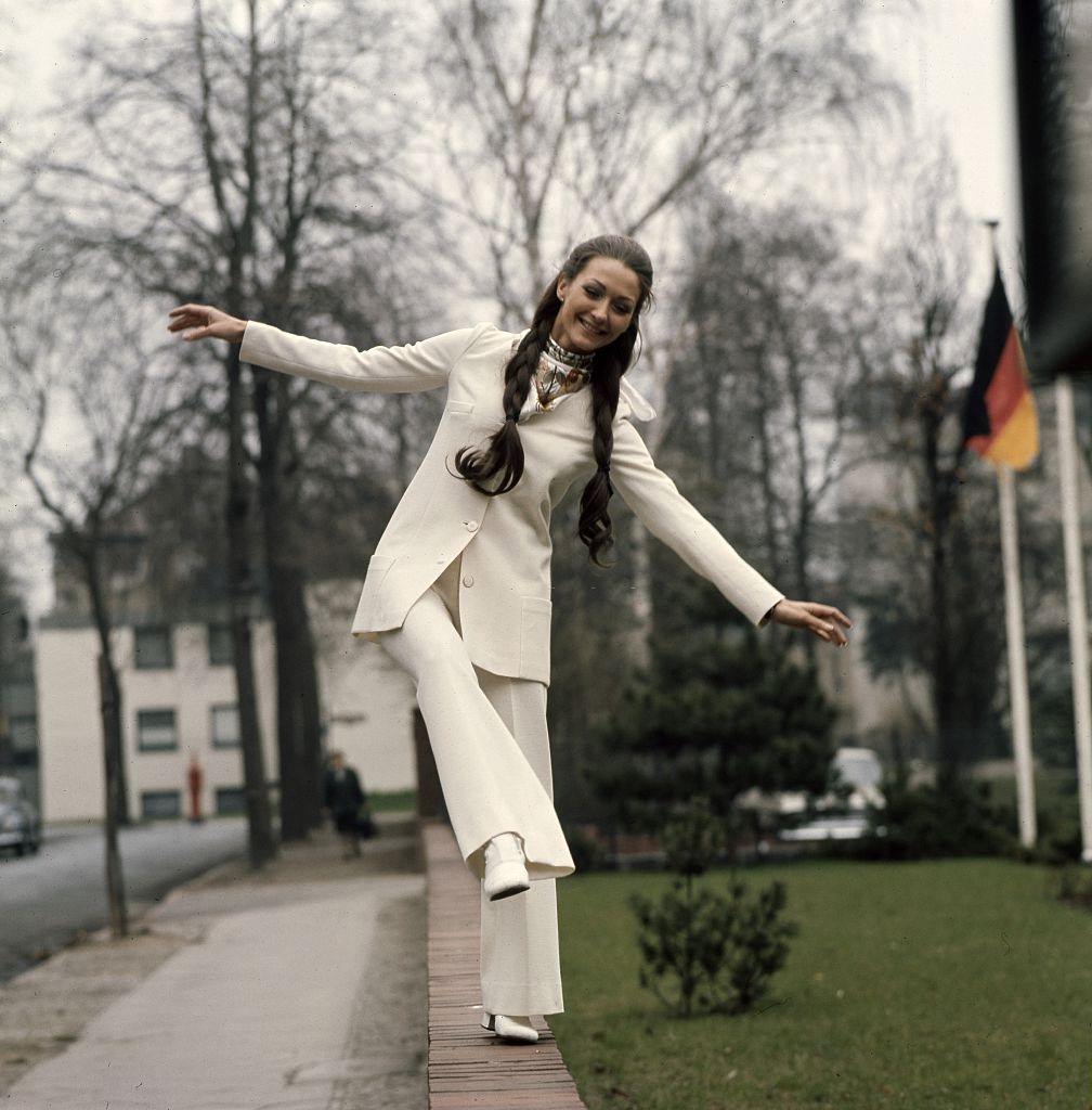 #41 Christine Kaufmann balancing on the wall, 1969.