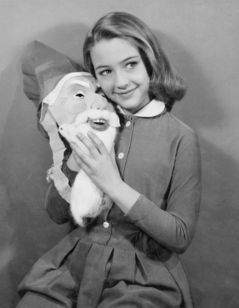 #6 Christine Kaufmann as child with Santa Claus mask, 1955.