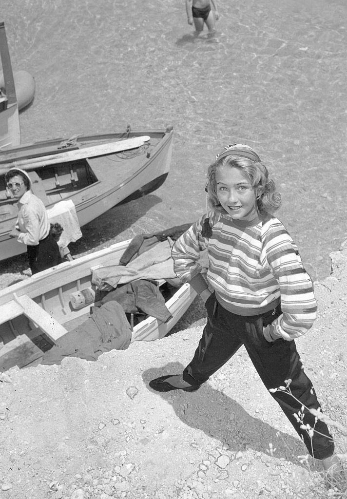 #7 Christine Kaufmann in a scene from the movie ‘Stimme der Sehnsucht’, 1956