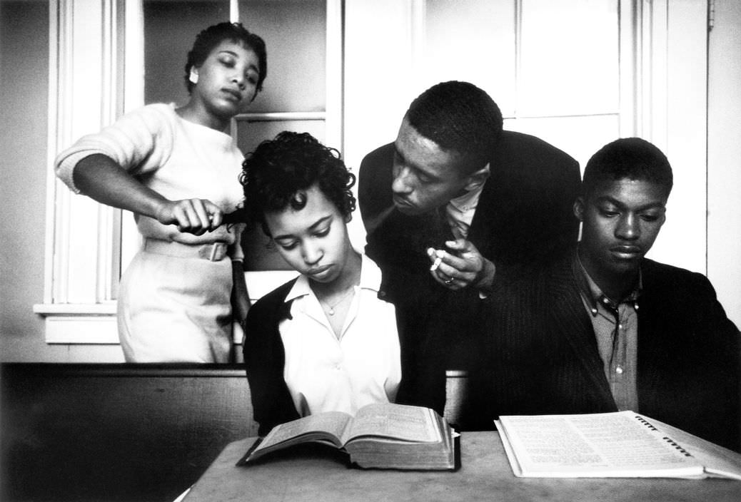 #8 Eve Arnold being trained to not react to smoke blown in her face and having hair pulled, 1960.