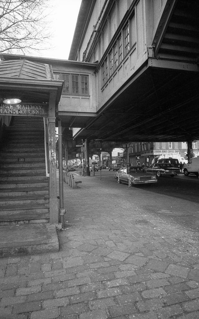 #5 Staircase leading to the elevated subway line at the intersection of Roosevelt Avenue and National Street, in the Corona neighborhood of Queens, 1982.