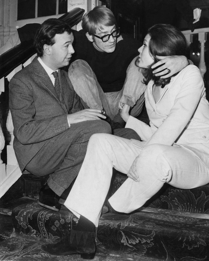 #20 Diana Rigg with actor David Warner and director Peter Hall, 1966.