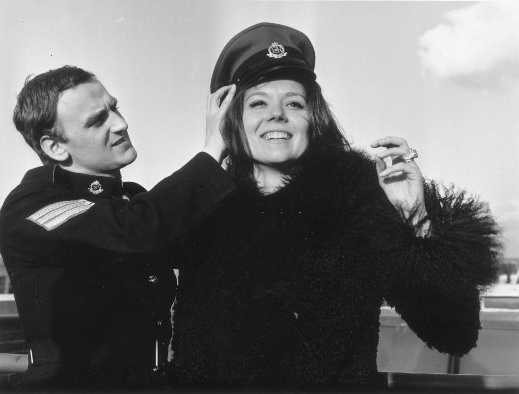 #24 Diana Rigg trying John Thaw’s hat on in Hanover Square, London, 1966.