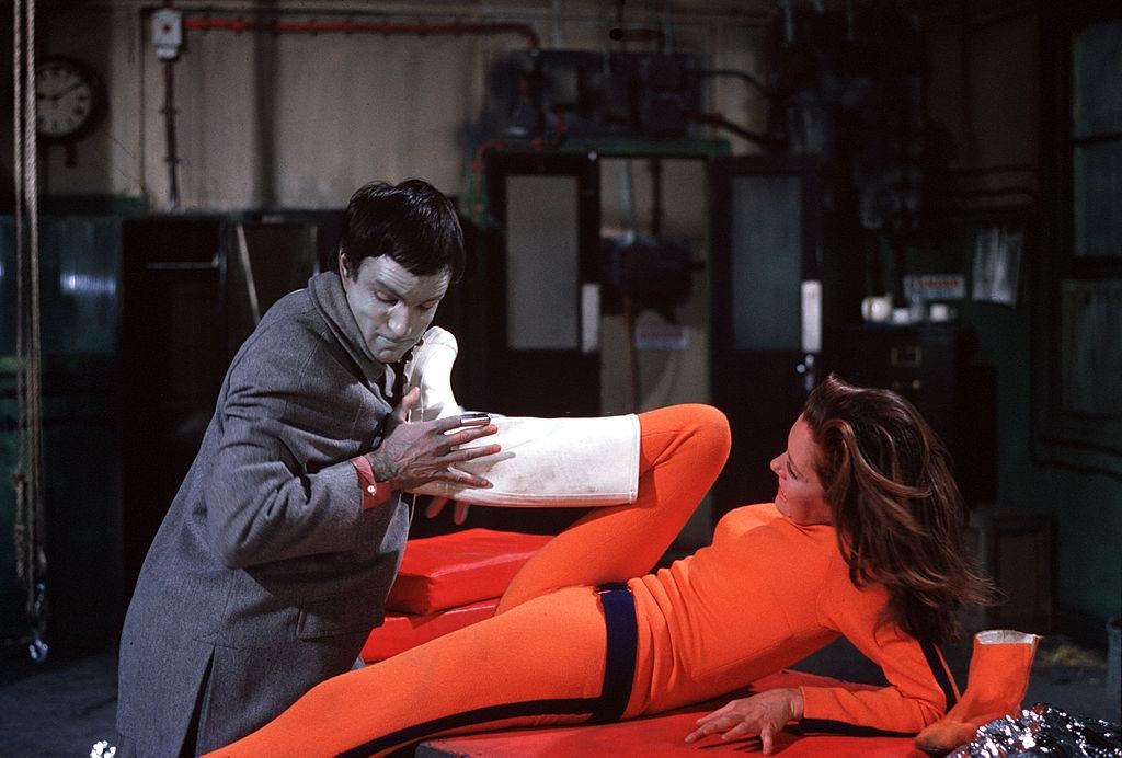 #31 Diana Rigg fights off a villain in a scene from the television series “The Avengers”, 1967.