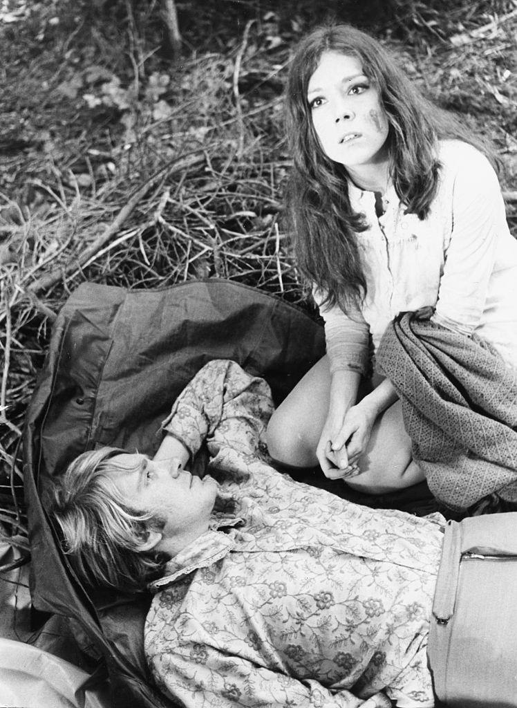 #43 Diana Rigg with David Warner in the grounds of Compton Verney, on location filming ‘A Midsummer Nights Dream’, 1967.