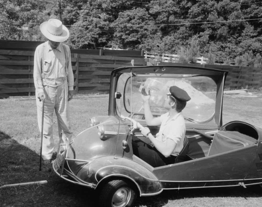 #2 Elvis in a 1955 Messerschmitt KR 200. It was a three-wheeled, two-seated bubble car built by a German aircraft manufacturer.