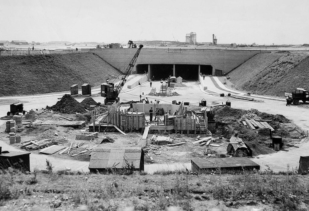 #14 Construction of the main access tunnel under the runway to the central terminal area at Heathrow airport, 1953.