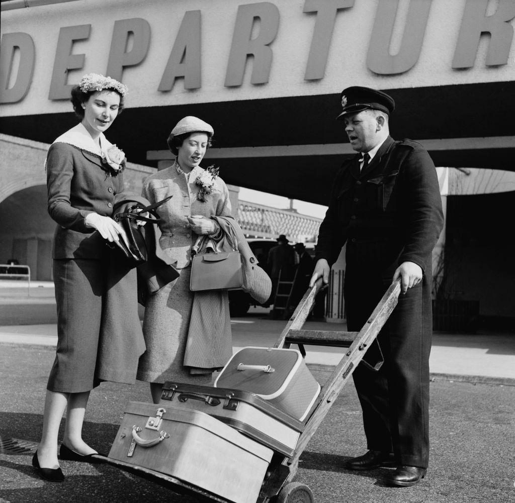 #15 English journalist Anne Scott-James with Joan Downes at Heathrow Airport before a tour of Europe, 15th March 1954.