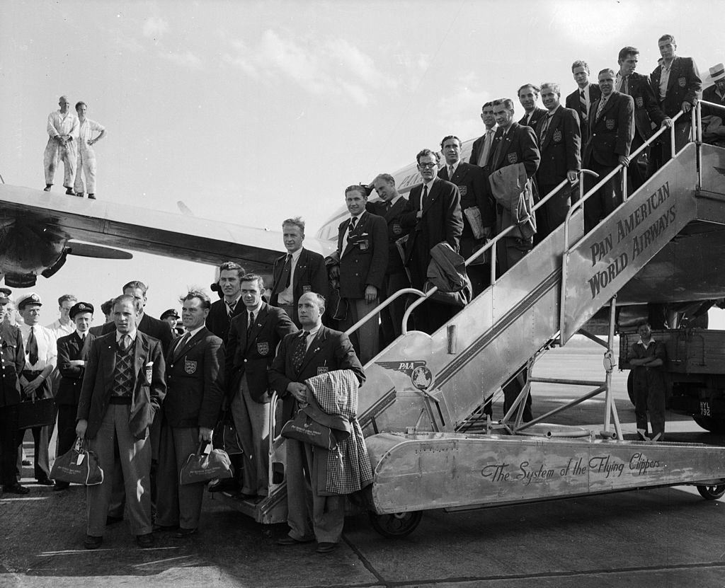 #16 The England football team arrives back at London Airport (Heathrow) from Rio after failure in the World Cup, 10th July 1950