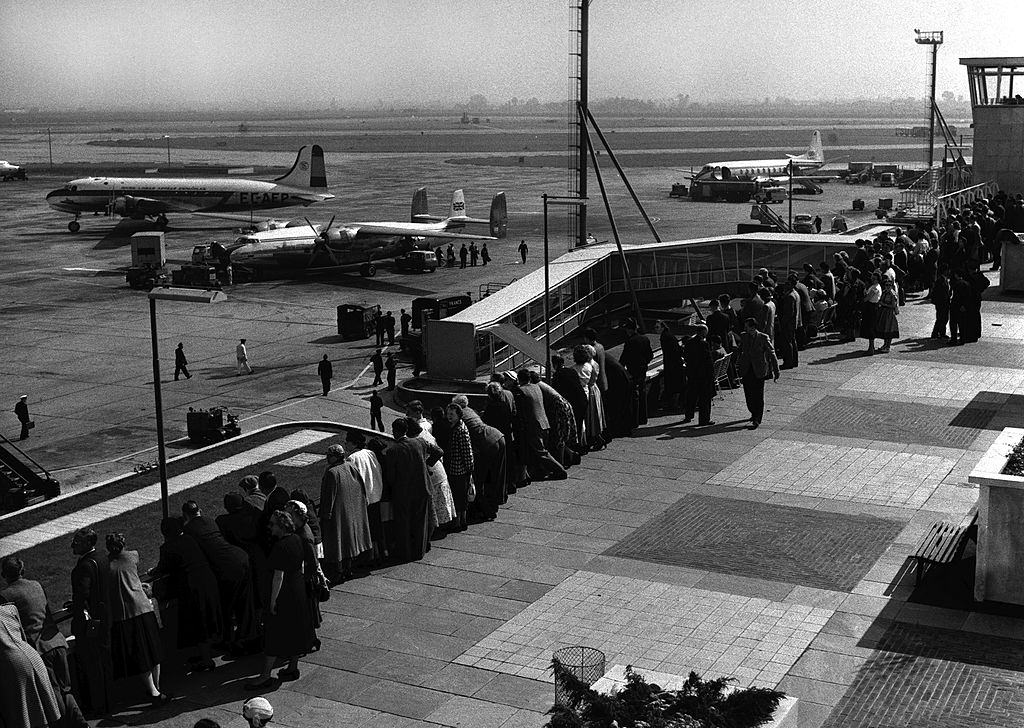 #6 Apron and the flat roof where friends and family of traveling passengers can wave goodbye as the planes takeoff, 1955.