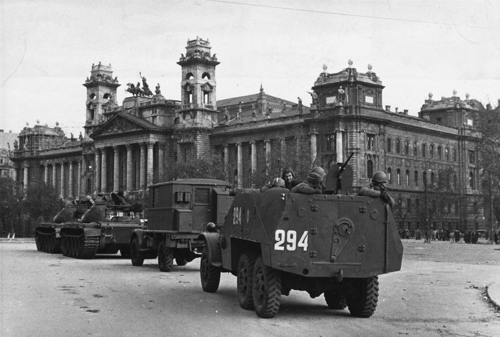 Soviet tanks surround the Parliament Building in Budapest during the repression of the anti-Communist revolution.