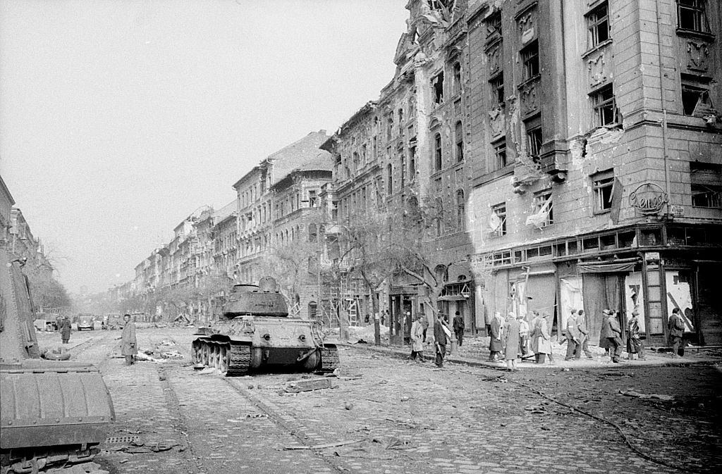 #67 A panzer standing in a street of the capital destroyed by the fights.