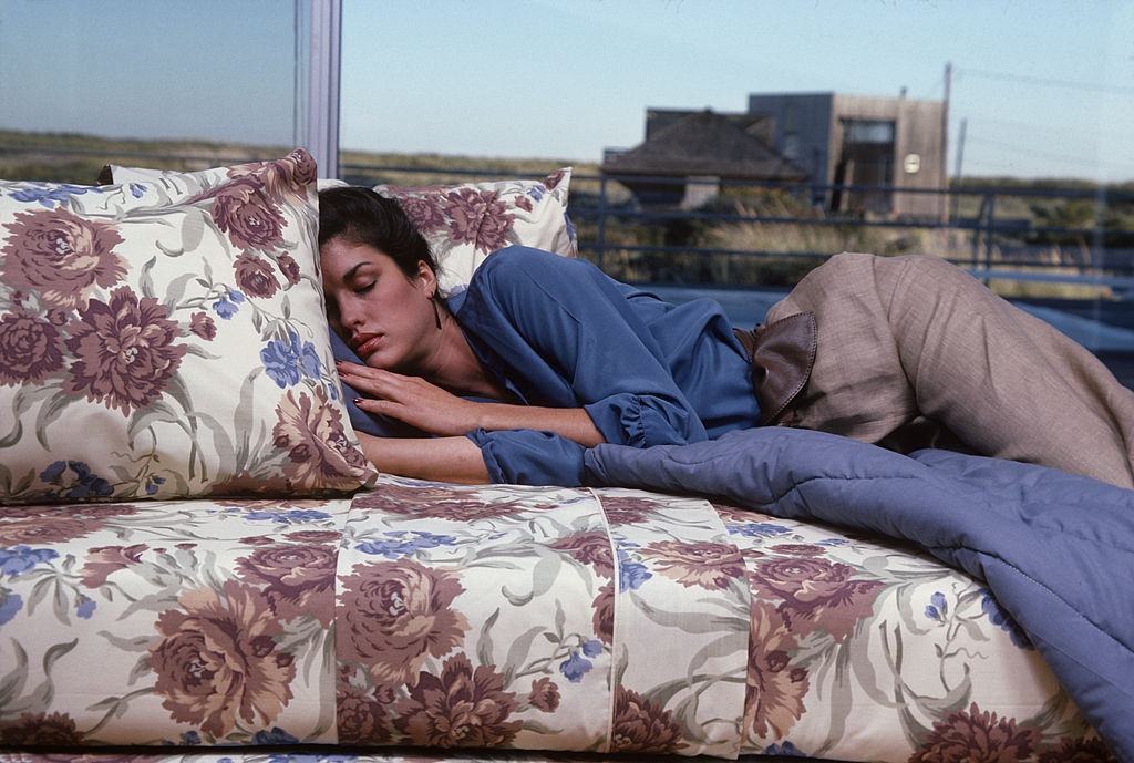 #13 Janice Dickinson dressed in a blue silk shirt, 1978.