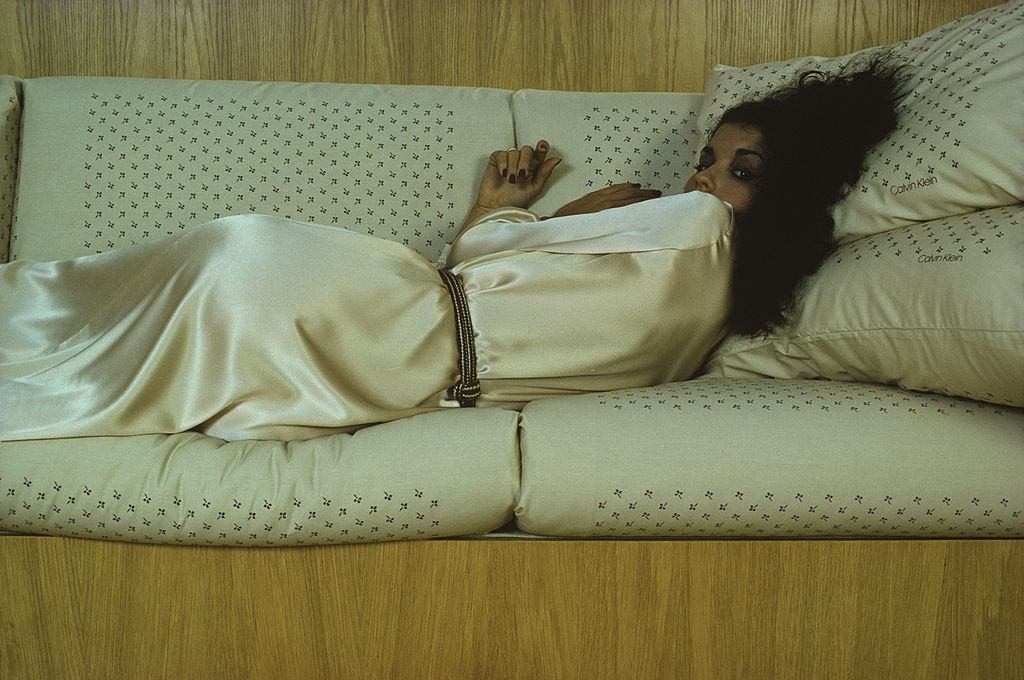 #19 Janice Dickerson dressed in a silk gown, 1978