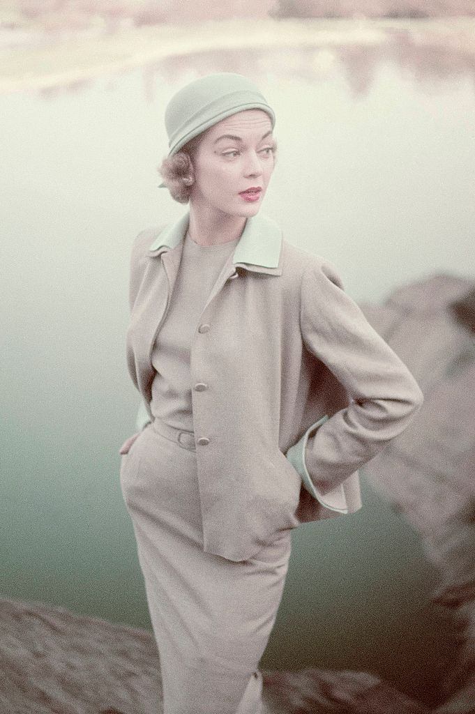 #19 Jean Patchett wearing a Siamese silk plaid bare and bouffant sun dress. Vogue 1951.