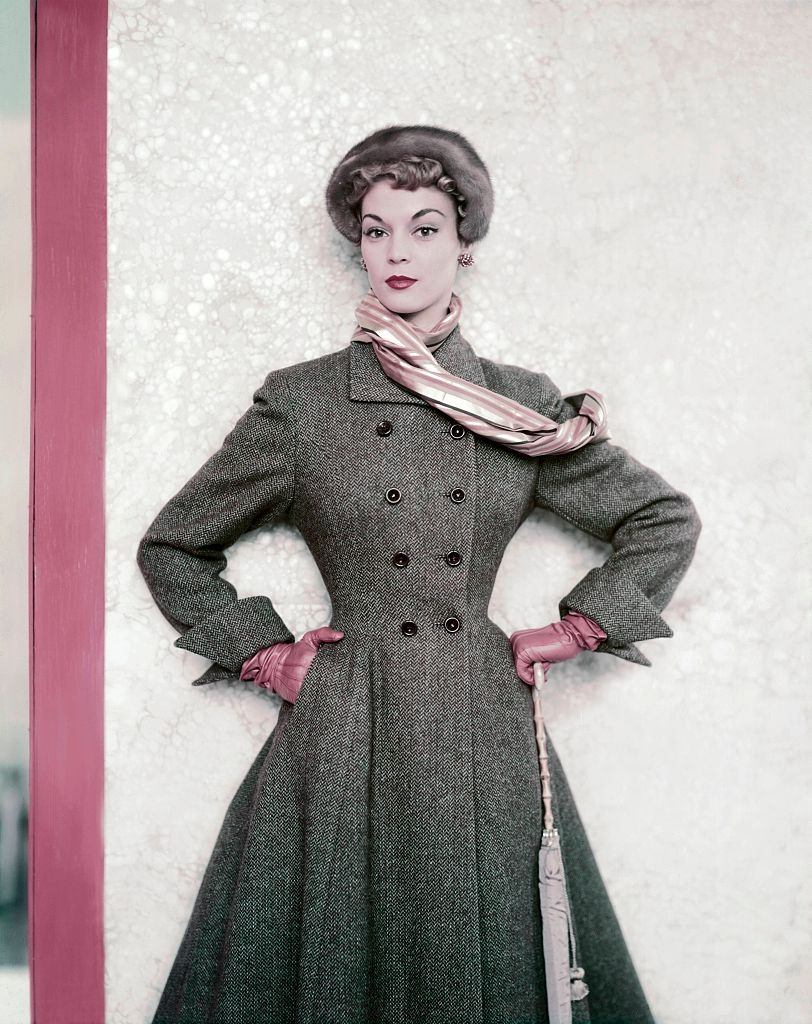 #23 Jean Patchett wearing a tweed winter coat from the Paris Collections, 1951.